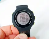 Locosys GW-60 GPS-Uhr mit Anzeige von 11:50 Uhr und fünf Zeitmessungen.
