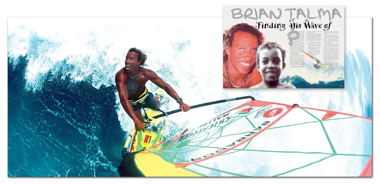 Brian Talma surft auf einer Welle, sein Segel zeigt