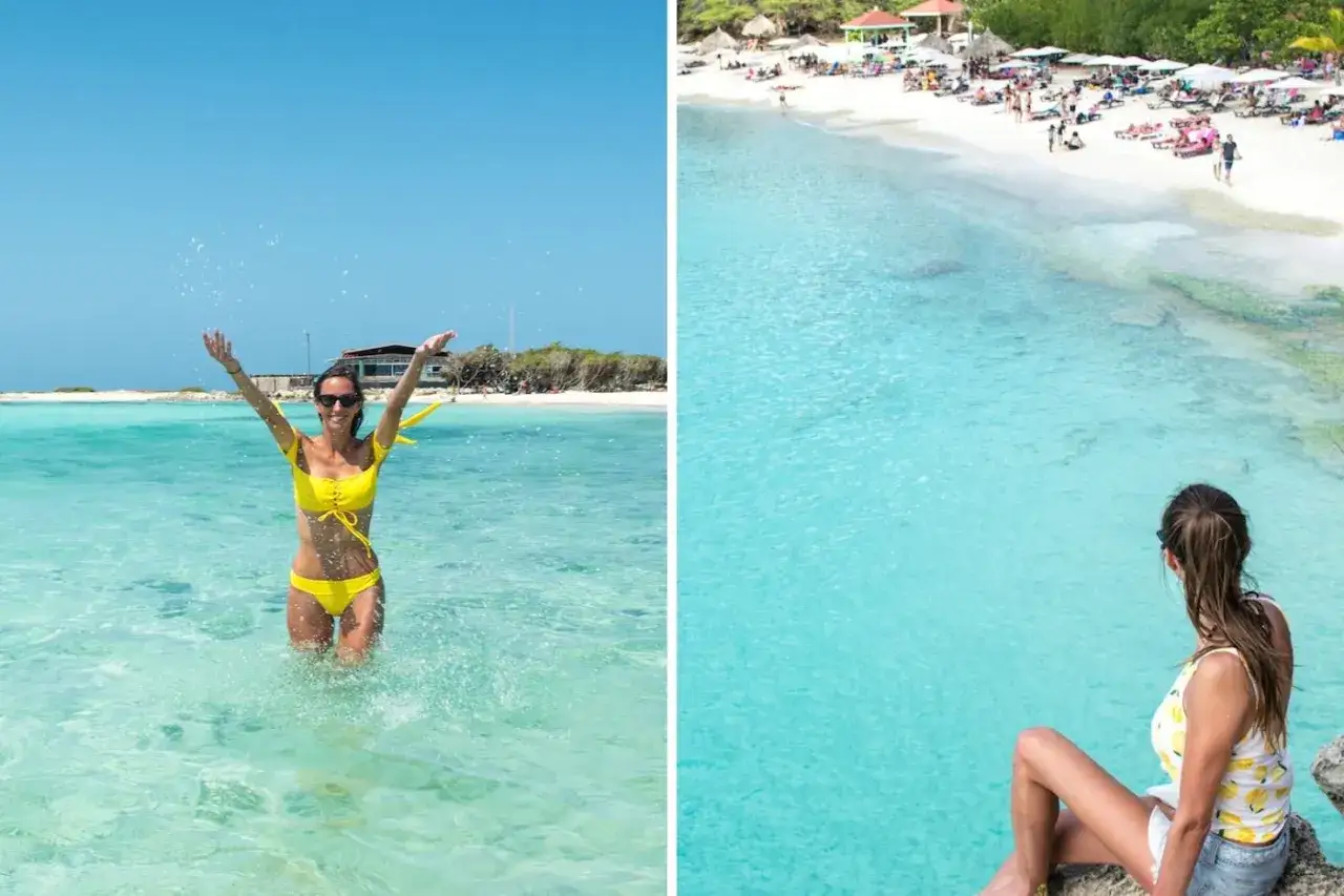 Frau im gelben Bikini planscht im t&uuml;rkisfarbenen Wasser, im Hintergrund eine belebte Bucht. Ein Traumurlaub auf Aruba oder Curacao.